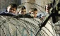 Israeli soldiers abuse Palestinians at roadblocks