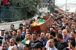 تشییع پیکر شهید غزاونه