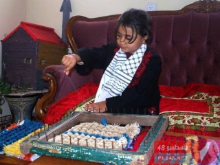 کوچکترین بافنده فرش جهان درغزه