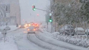 In photos: snowstorm bringsIsrael to a grinding halt