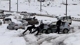 In photos: snowstorm bringsIsrael to a grinding halt