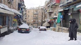 In photos: snowstorm bringsIsrael to a grinding halt