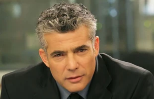 Lapid urges firing chief rabbis over army services