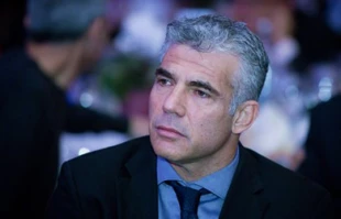 Lapid halts money transfers to settlements
