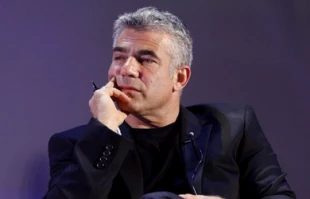 Lapid halts money transfers to settlements