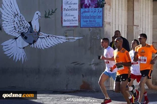 Thousands run the Palestine Marathon in Beit Lahm