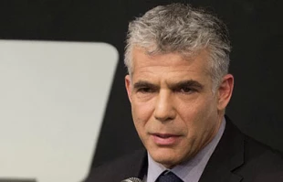 Lapid admits to unprecedented costs of war