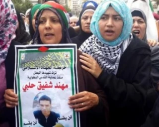 تاکید مادر شهید مهند الحلبی بر استمرار راه مقاومت