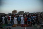 Palestinians perform Eid al-Adha prayers in Gaza, WB 9