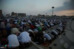 Palestinians perform Eid al-Adha prayers in Gaza, WB 10