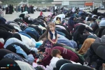 Palestinians perform Eid al-Adha prayers in Gaza, WB 16