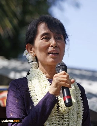 Suu Kyi idle by
amid genocide