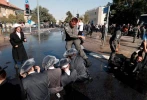 Violent clashes as Israelis protest joining army 13