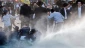 Mandatory Conscription protesters in Israel cracked down by stun grenades and water canon