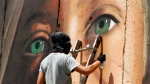 Israel detains Italian graffiti artists over Palestinian hero girl mural
 2