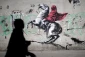 Banksy's subversive art draws tourists and locals in Paris