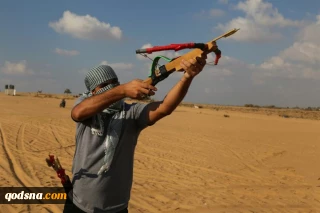 جدیدترین ابتکار فلسطینی‎ها در مواجهه با صهیونیست‎ها؛

یگان «تیراندازان آتشین» در غزه آغاز به کار کرد/ کارویژه اصلی در راهپیمایی بازگشت+ تصاویر