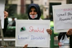 A gathering of people and academics to protest the killing of Muslims in Nigeria 12