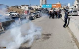 The Zionist military attack on the march of Palestinian and international journalists in northern Jerusalem 7