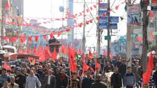 به مناسبت پنجاهمین سالگرد تاسیس جبهه دموکراتیک برای آزادی فلسطین برگزار شد؛

مراسم جشن مردمی و رژه نظامی گردان‌های مقاومت ملی در غزه به روایت تصاویر 8