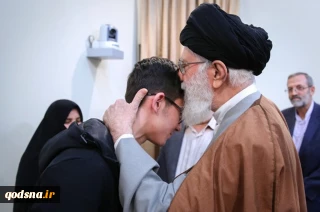 Leader
 honors young chess player