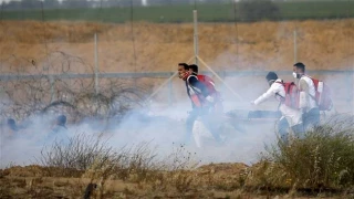 Israeli forces injure 60 Gazans, 15 of them children