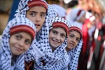 مسيرة بغزة لإحياء يوم الزي الفلسطيني 4
