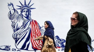 Iran unveils new murals on walls of former US embassy