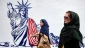 Iran unveils new murals on walls of former US embassy