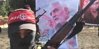 با نزدیک شدن به روز جهانی قدس صورت گرفت؛

مانور جنبش فلسطینی با تصاویری از سردار سلیمانی و دبیر کل حزب الله لبنان