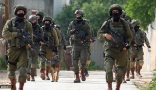 Israel arrests two Hamas leaders in West Bank raids