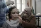 Gaza girl dons 3D-printed mask to heal burnt face