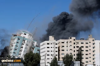 Israeli air strikes kill eight children and flatten Gaza building housing international media outlets