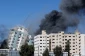 Israeli air strikes kill eight children and flatten Gaza building housing international media outlets