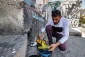 Palestinian artist paints murals on Israeli barrier