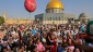 Over 100,000 Palestinians attend Eid prayers at Al-Aqsa Mosque following Israeli storming