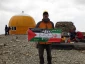 Flag of Palestine waved on peak of Tochal mountain
