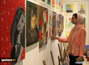 Visitors view artworks made by Palestinian children during exhibition in Gaza City
 4