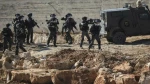Israel attacks protesters along security fence with Gaza
 2