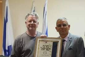 Israel Prize winner to donate award money to groups fighting to end the occupation
