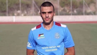 Zionist troops martyr Palestinian football player during West Bank raid
