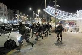On the Int’l Quds Day:

Zionist troops storm holy al-Aqsa mosque gates, Palestinians confront raids