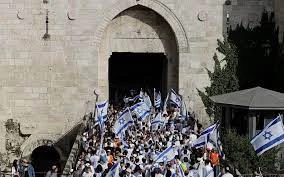 Hamas: Zionist flag march a failed Judaization attempt