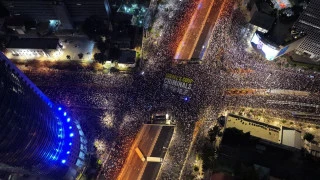 Protesters rally in their thousands against Israeli cabinet's policies for 32nd week
