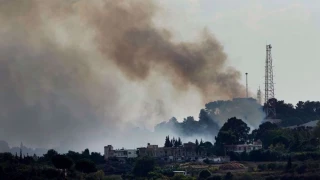 Hezbollah strikes Israeli military positions near border with rockets, drones