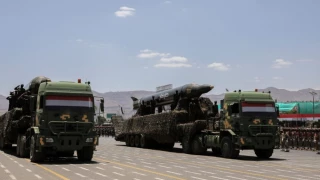 Yemen vows 'very painful' response after US-UK strikes kill over a dozen