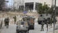 Zionist troops torch house in Jenin, seizes several cars in Ramallah
