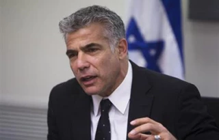 Lapid admits to unprecedented costs of war