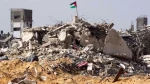 The head of Gaza’s Government Media Office says more than 12,000 bodies are estimated to be trapped under the rubble in the strip, amid Israeli restrictions on the entry of needed heavy machinery.
