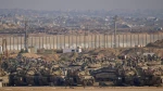 Israel shifts frontline deeper into Gaza, strikes hit families trapped inside